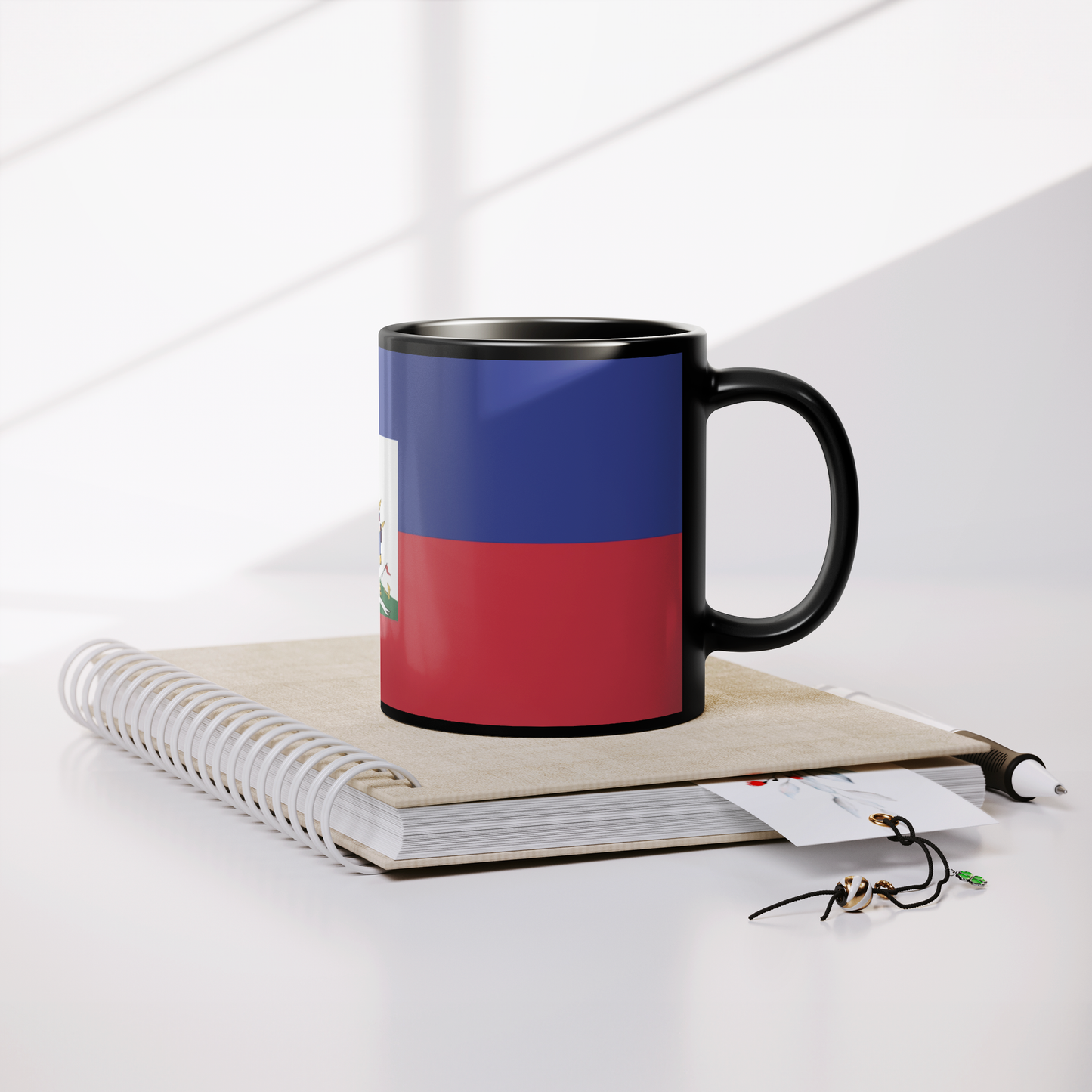 haiti_flag_11oz_Black_Mug_Lifestyle_Notebook_Mockup.png_15335491